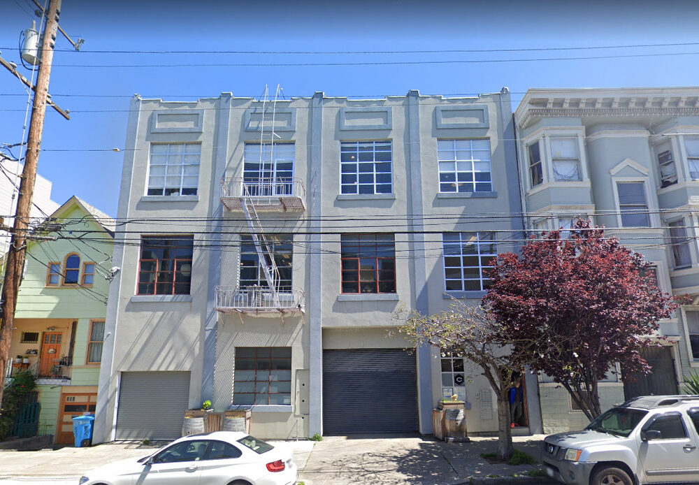 2419 Harrison Street building exterior with drive-in door