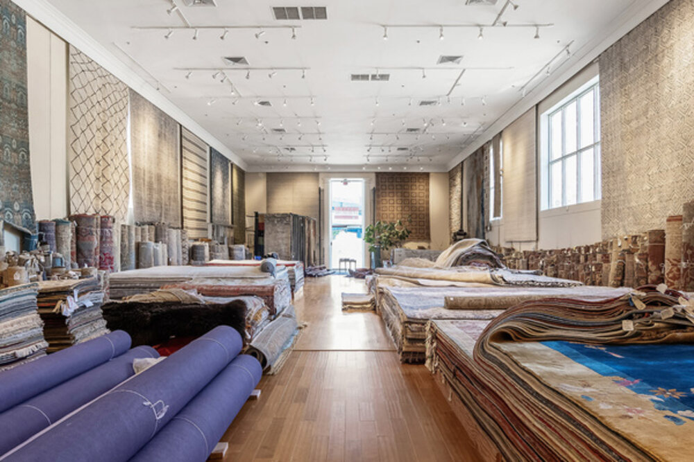 135 Vermont Street open interior with high ceilings and hardwood floor