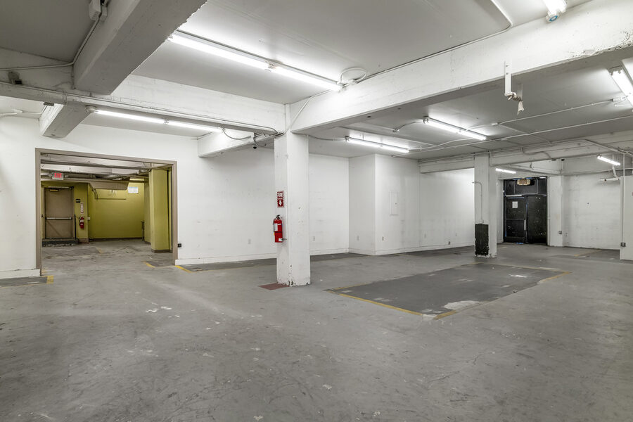 245 S Van Ness Avenue interior with concrete floor and columns