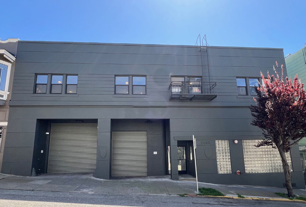 1469 Pacific Avenue building exterior with two drive-in doors