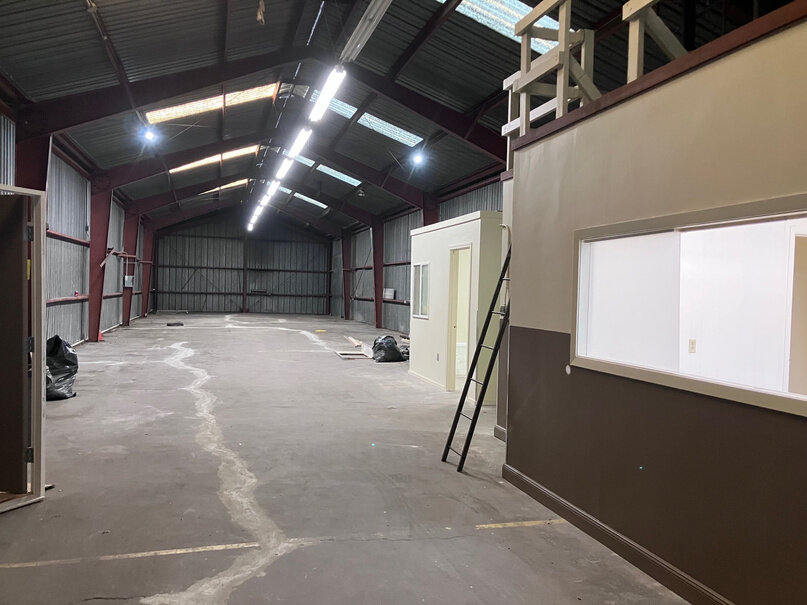 22 Loomis Street clear-span warehouse interior with office and drive-in door